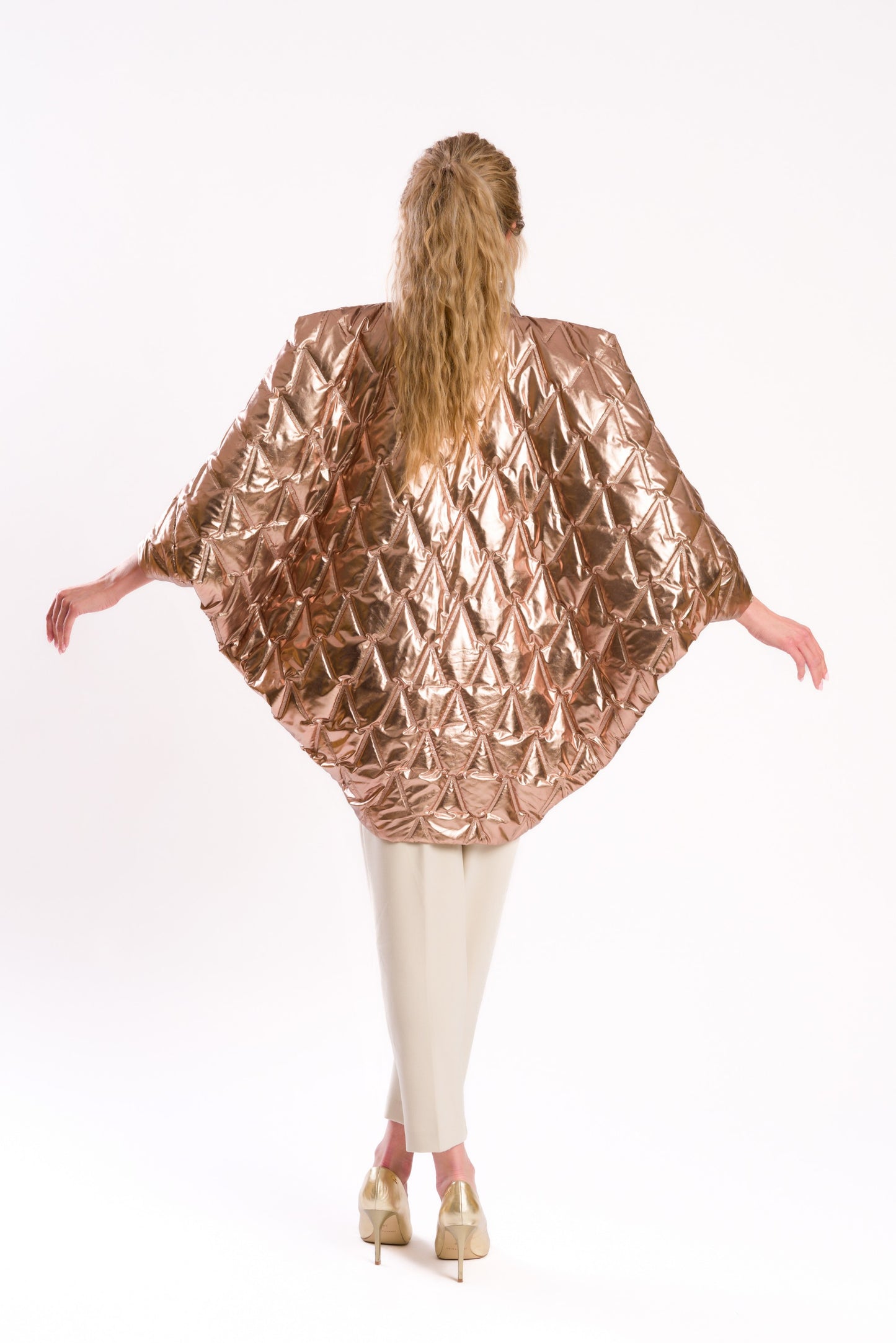 The metallic puffer poncho