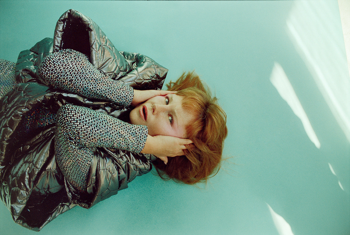 The gunmetal puffer poncho