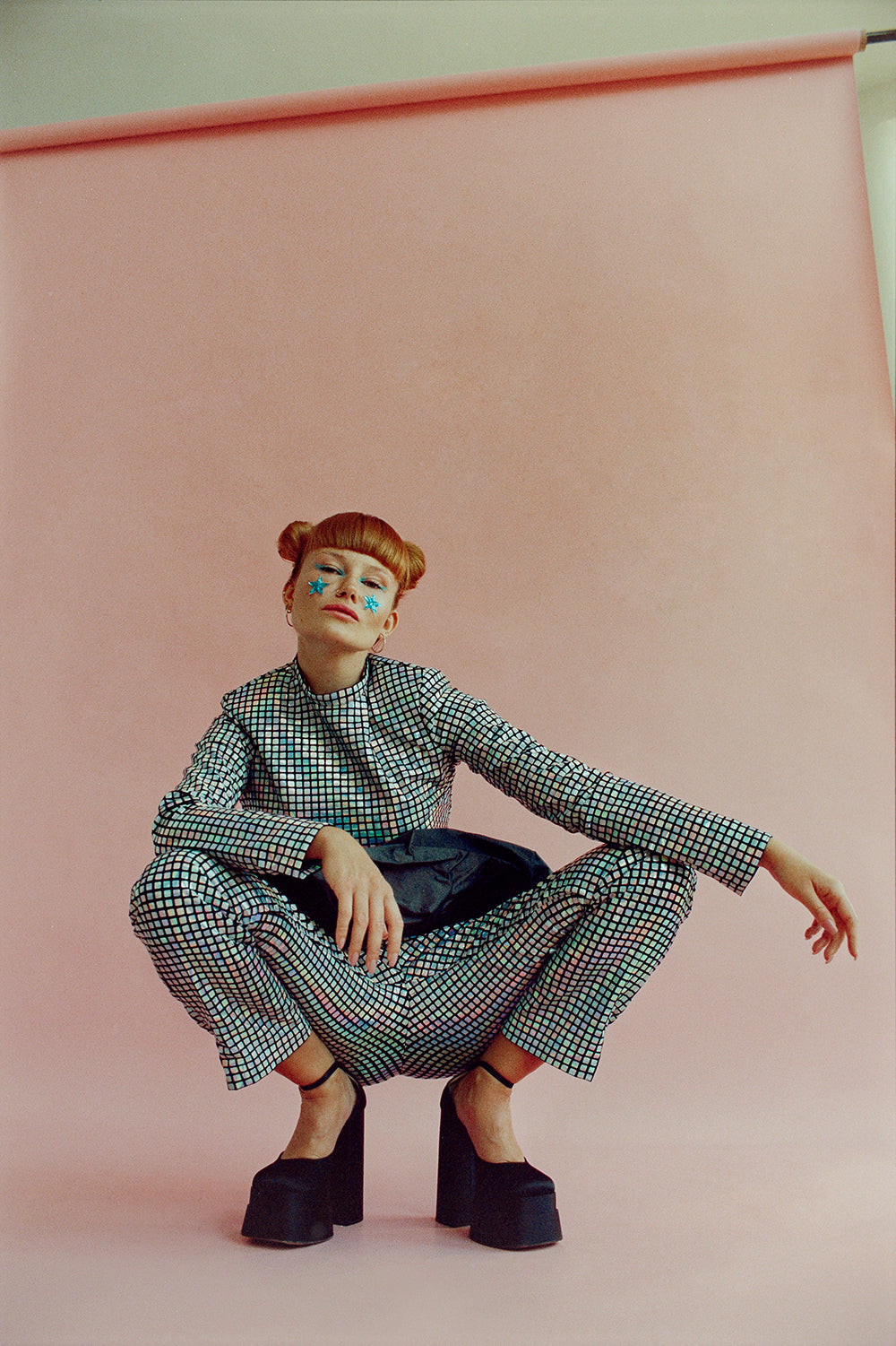 Long sleeved glittered top with ruffle